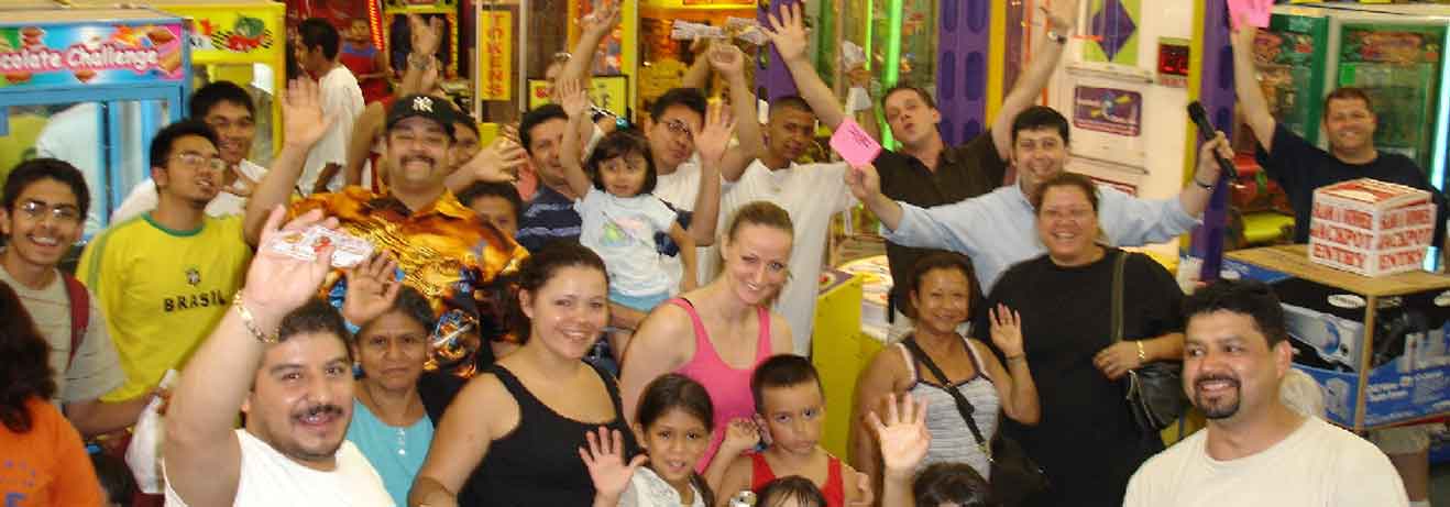 Group of people waving to camera