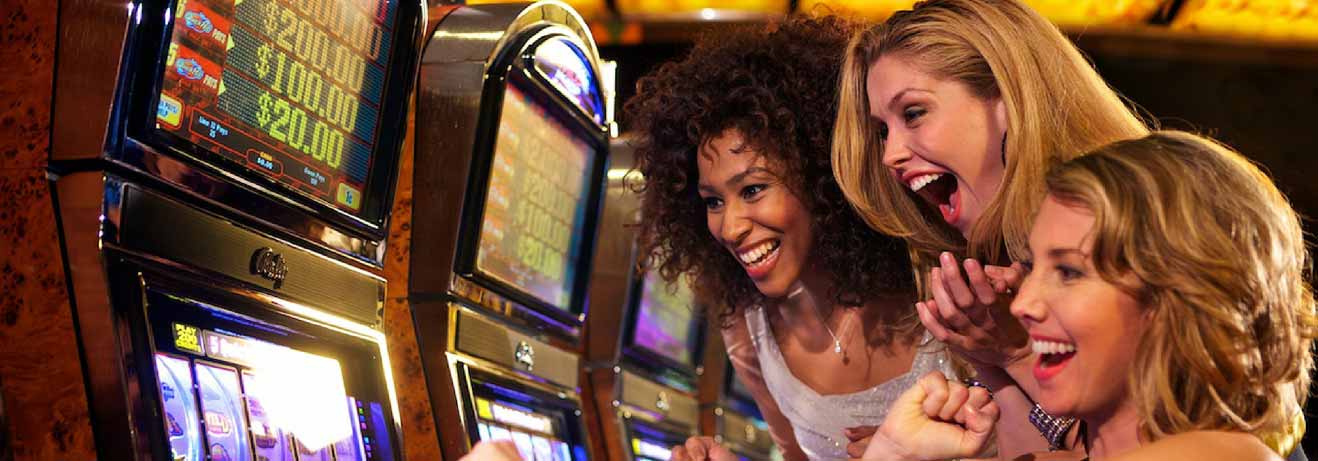 Women Playing Slot Machines